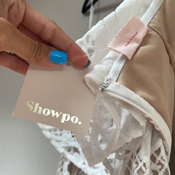 Brand new with tags white lace bridal dress. Beautiful details and strapless - Picture 2 of 6